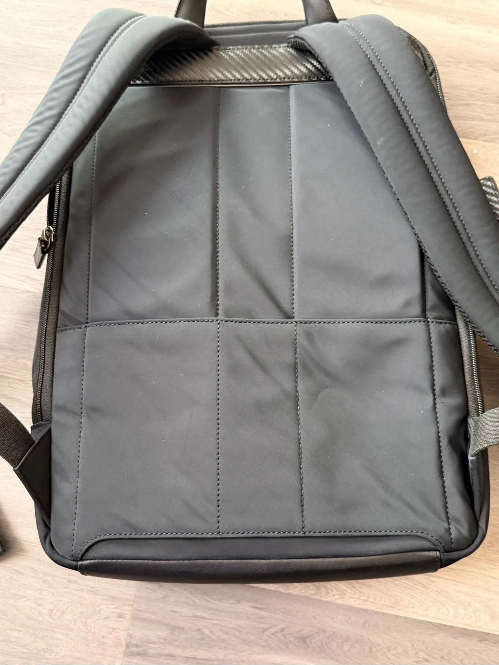 TUMI Monroe Foxwood Black BackpackCarbon Fiber Accents
